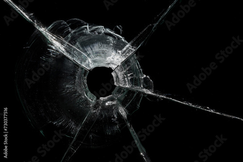 Cracked Pieces Broken Glass Hole on Black Background