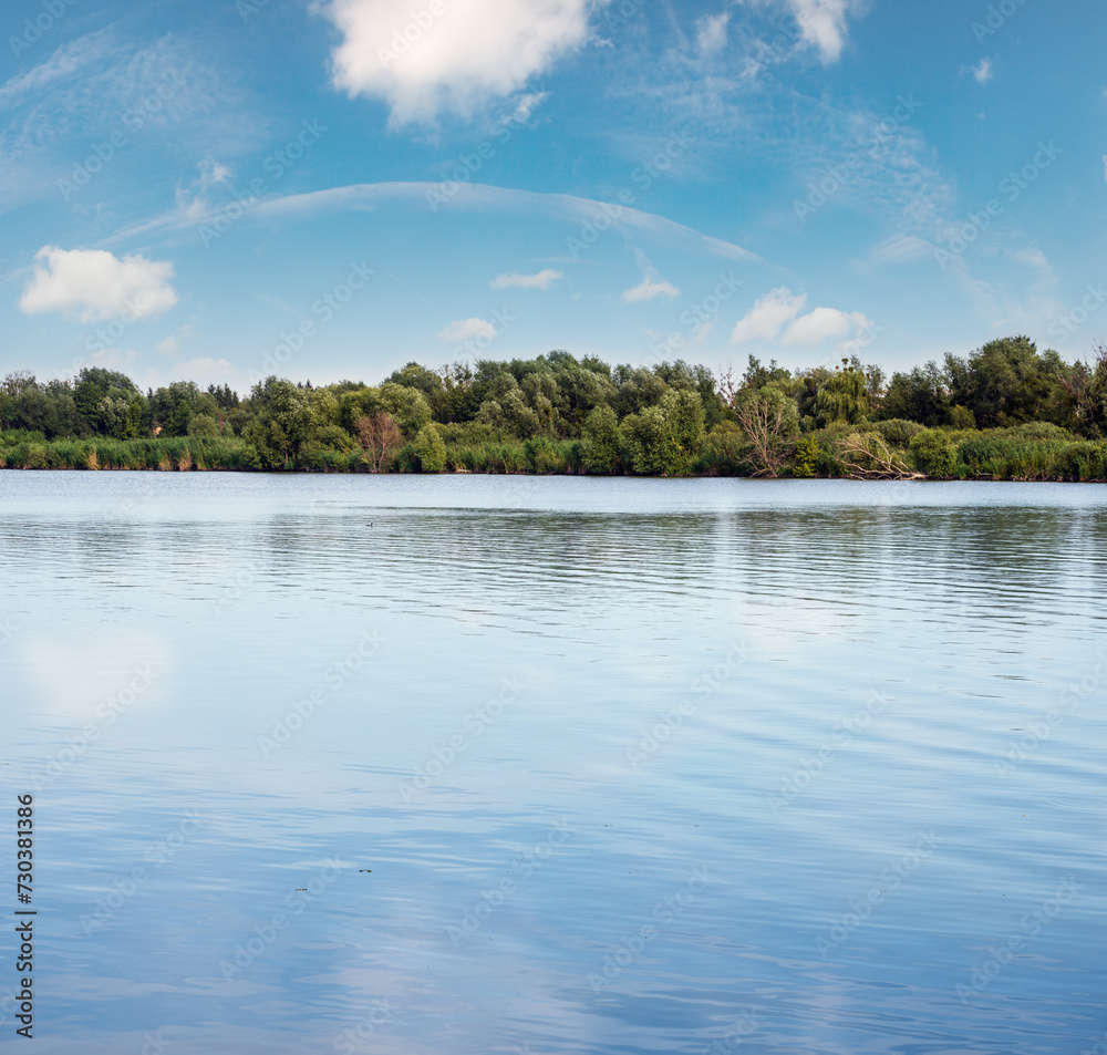 Summer hazy day on picturesque lake Summer hazy day on picturesque lake