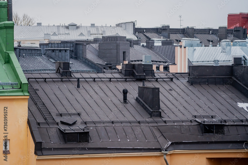 A modern black tin roof for an apartment building
A modern black tin roof for an apartment building