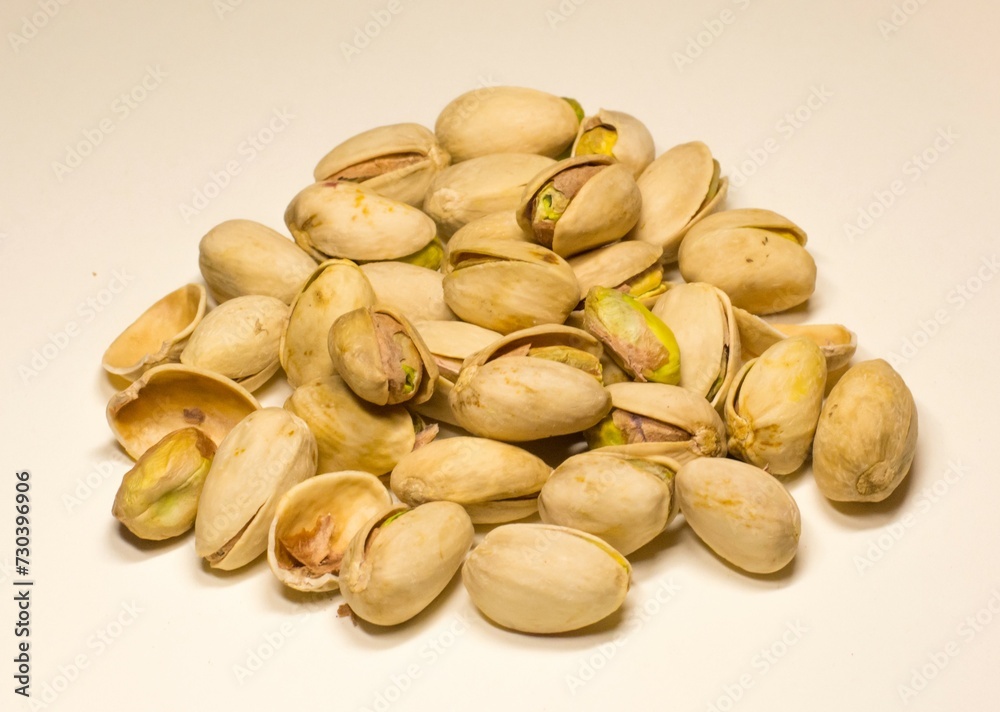 pistachio nuts on white background pistachio nuts on white background