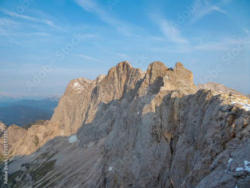 Panoramic view of majestic mountain peak Hoher Dachstein in Northern Limestone Alps  Styria  Austria. Scenic hiking trail in wilderness Austrian Alps. Peace of mind  calmness. Wanderlust in nature