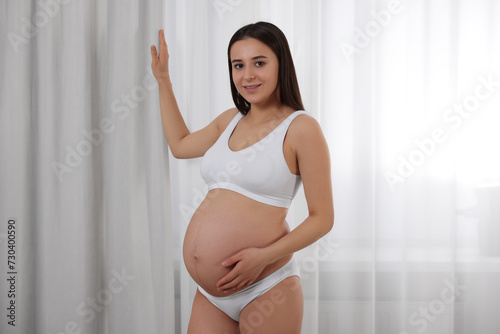 Beautiful pregnant woman in stylish comfortable underwear indoors Free Download Beautiful pregnant woman in stylish comfortable underwear indoors - GFXLoad