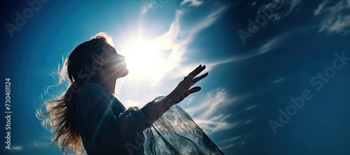 Silhouette of a religious person in the sky. Spiritual or religious concept. 