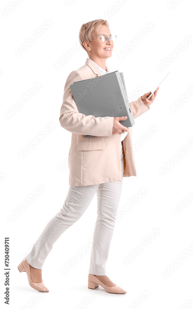 Mature businesswoman with folders and tablet computer on white background Mature businesswoman with folders and tablet computer on white background