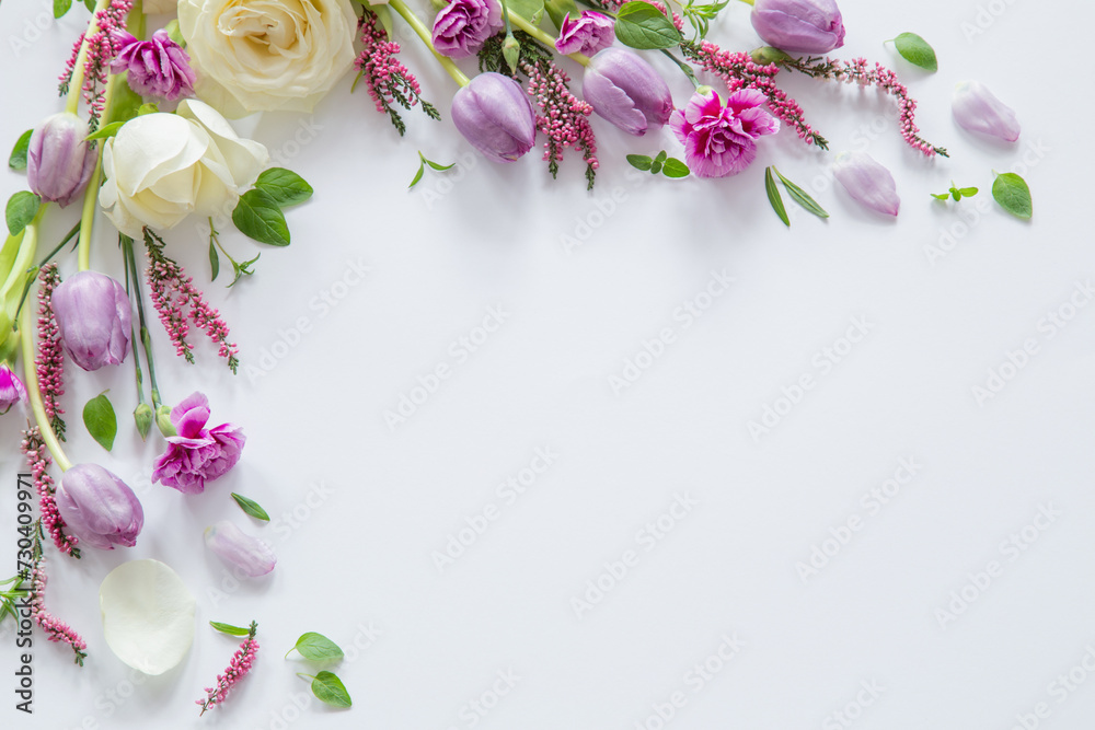 frame of beautiful flowers on white background