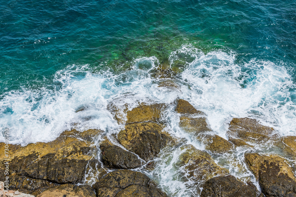 Beautiful view of waves Atlantic ocean breaking against rugged large rocks. Spain. Beautiful view of waves Atlantic ocean breaking against rugged large rocks. Spain.