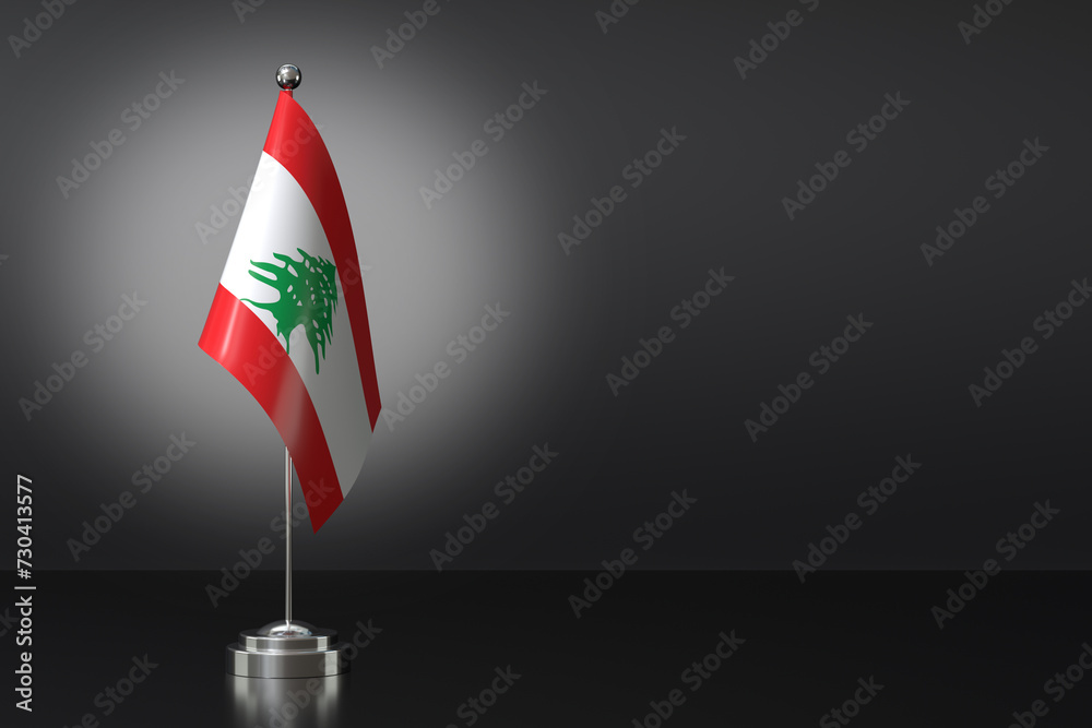Fototapeta premium Small Republic of Lebanon Flag in Front of Black Background, 3d Rendering