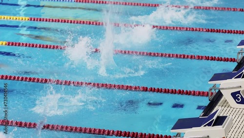  Swimmers start race in Burevestnik basin during All Russia Swimming Championship, Alexander Popov Cup. Slow motion photo