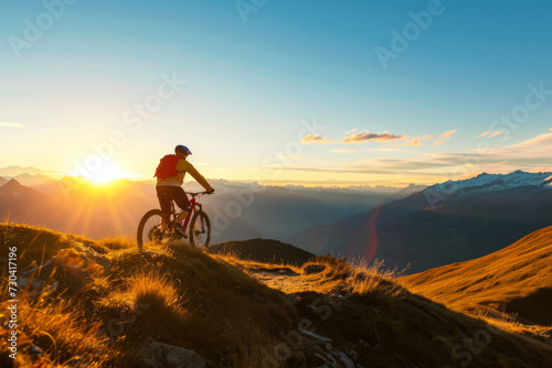 mountainbiker in the alps during sunset  © Mathias