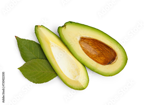 Cut fresh avocado and leaves on white background