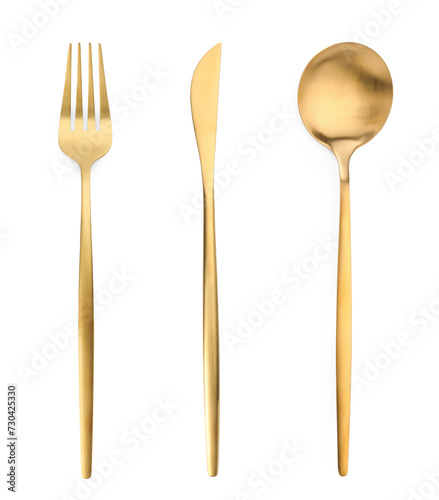 Golden fork, knife and spoon isolated on white, top view