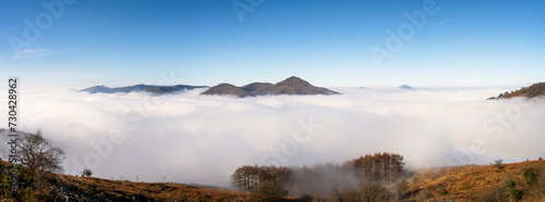 Amazing sea of clouds panorama above the mountains of the Basque Country. Spain. 