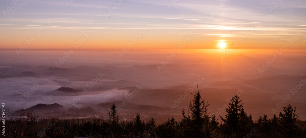 Hazy landscape at sunset time. View from Jested Mountain, Liberec, Czech Republic