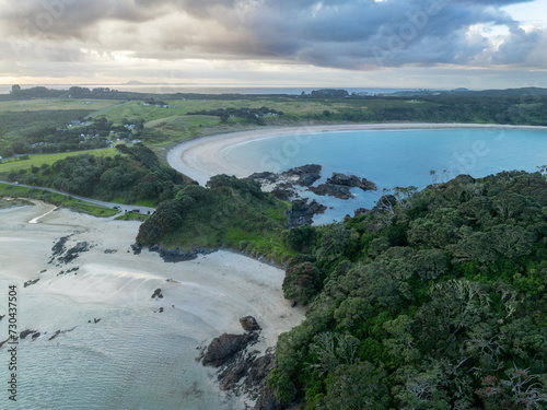 Matai Bay and the karikari Peninsula at sunset, Northland, New Zealand. photo