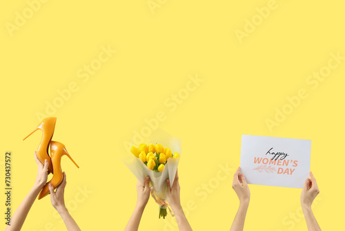 Female hands with bouquet o...