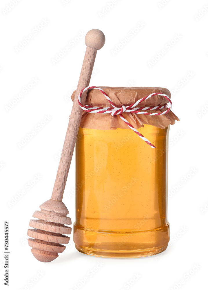 Tasty honey in glass jar and dipper isolated on white Tasty honey in glass jar and dipper isolated on white