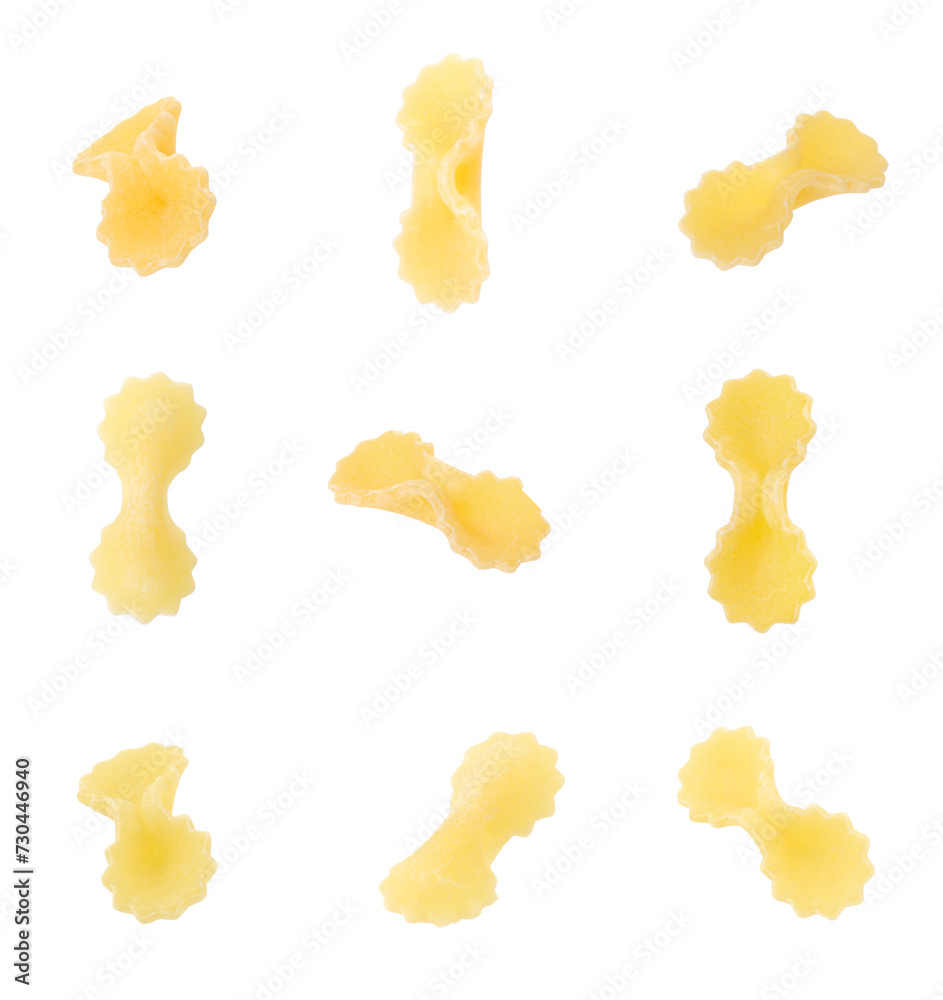 Naklejka premium Raw farfalline pasta isolated on white, set
