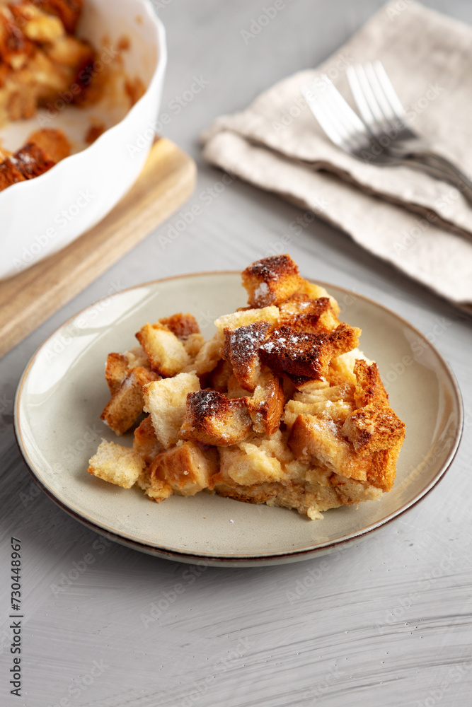 Homemade Bread Pudding on a Plate, side view. Homemade Bread Pudding on a Plate, side view.