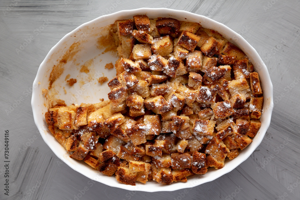 Homemade Bread Pudding in a Dish, top view. Flat lay, overhead, from above. Homemade Bread Pudding in a Dish, top view. Flat lay, overhead, from above.