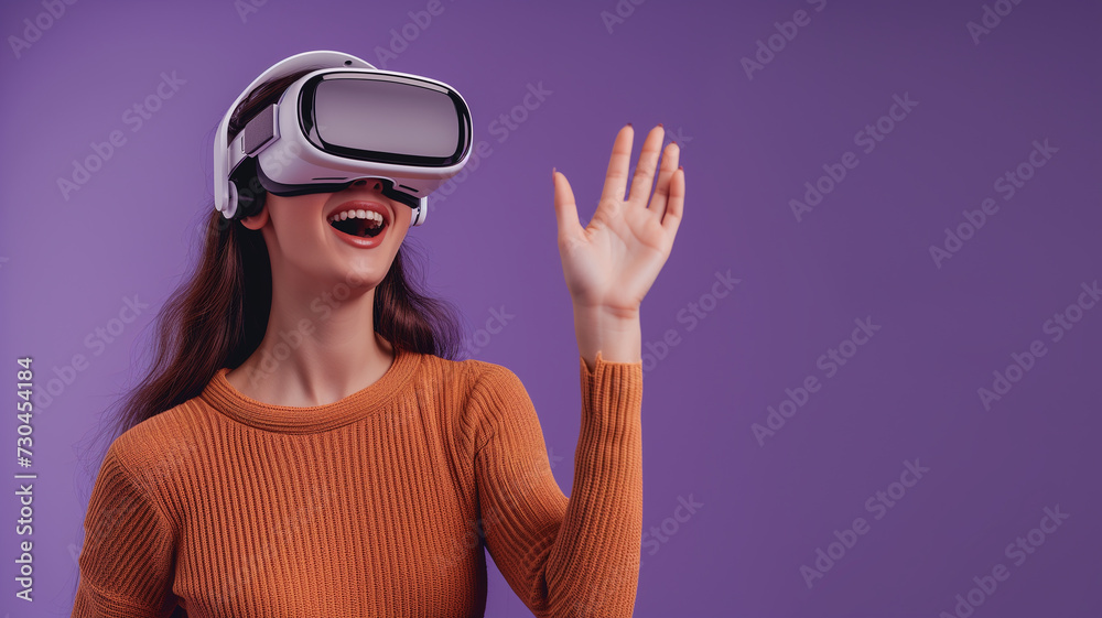 A girl in virtual reality glasses touches something invisible