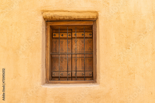 Obraz na płótnie Metal bars on a wooden shuttered window in the At-Turaif UNESCO World Heritage Site. w salonie