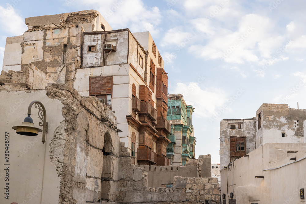 Traditional Hijazi tower house with wooden Rosan windows and balconies.