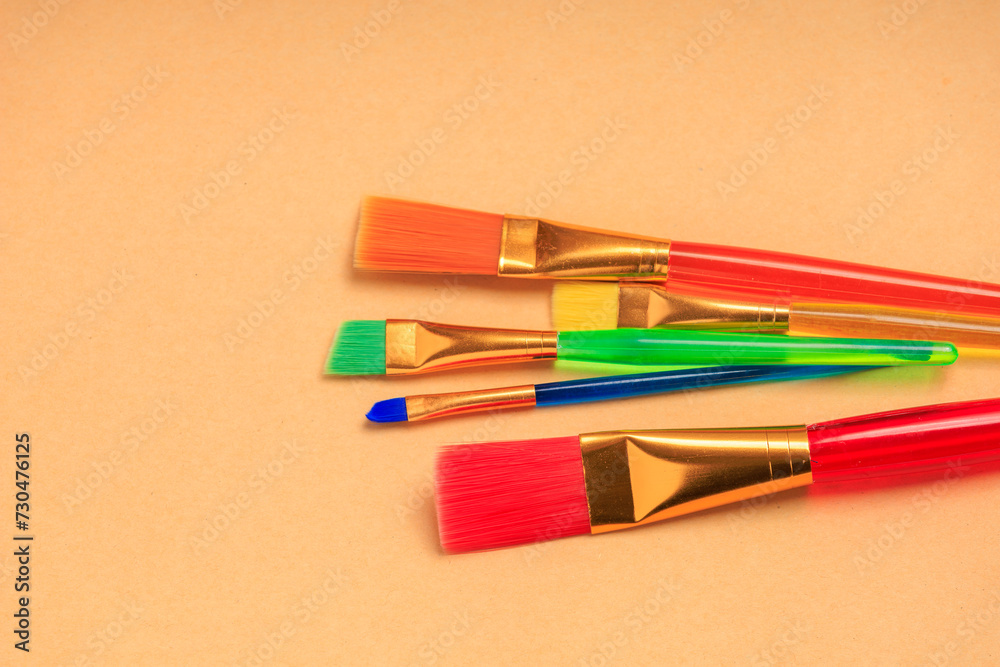 Fototapeta premium Paint brushes. Background with selective focus and copy space