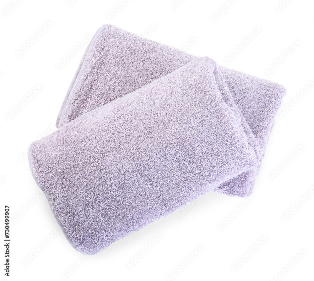 Folded violet terry towels isolated on white, top view Folded violet terry towels isolated on white, top view