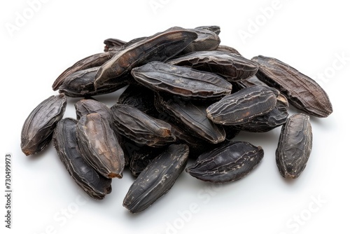 Isolated tonka beans on a white background photo