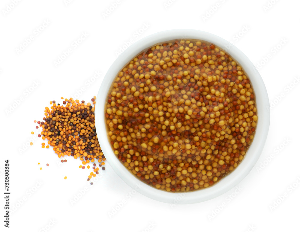 Fresh whole grain mustard in bowl and dry seeds isolated on white, top view Fresh whole grain mustard in bowl and dry seeds isolated on white, top view