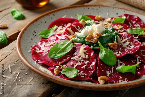 Healthy vegetarian Italian cuisine Beet ravioli filled with ricotta spinach and nuts