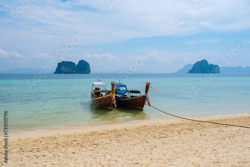 Fototapeta Naklejka Na Ścianę i Meble -  Longtail boats on the beach of Koh Ngai island tropical Island in the Andaman Sea Trang in Thailand