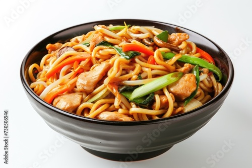 Asian fried noodles with chicken vegetables and a white background Chinese fried noodles with chicken shiitake mushrooms and a ceramic bowl Stir fr