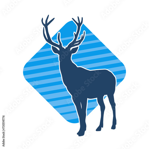 Silhouette of a deer wild forest animal with antlers. photo