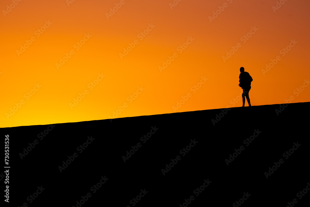 Silhouetted Explorer, Sand Dunes, Dumont Sand Dunes, Inyo County California, Death Valley National Park, Adventure, Exploration, Desert Trekking Silhouetted Explorer, Sand Dunes, Dumont Sand Dunes, Inyo County California, Death Valley National Park, Adventure, Exploration, Desert Trekking