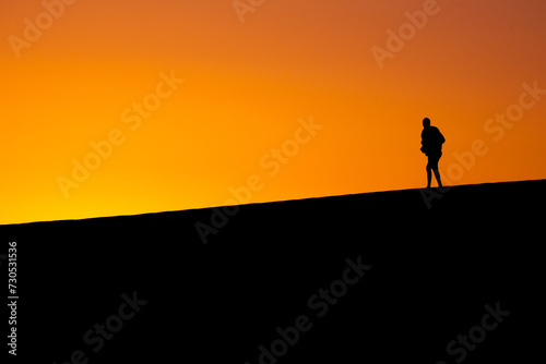 Silhouetted Explorer  Sand Dunes  Dumont Sand Dunes  Inyo County California  Death Valley National Park  Adventure  Exploration  Desert Trekking