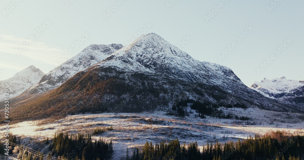 Winter's Majesty: Snow-Capped Peaks at Dawn in Norway