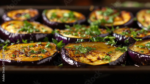 Firekissed eggplant slices with a caramelized exterior and a tender meltinyourmouth center. This clic dish is elevated by the addition of savory herbs and a drizzle of olive