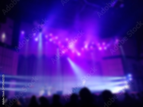 Blurred of light effected from music concert stage in Big  hall for music background, christian praise and worship concept, abstract art design. © isara