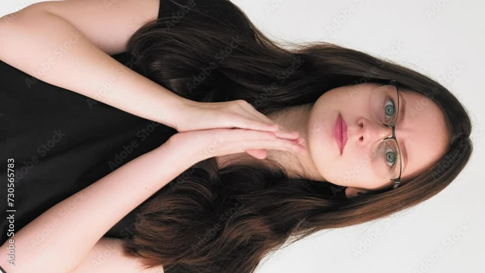 Vertical video. Anxious expectation. Hard choice. Troubled confused nervous woman rubbing palms biting lips waiting isolated on white. Vertical video. Anxious expectation. Hard choice. Troubled confused nervous woman rubbing palms biting lips waiting isolated on white.