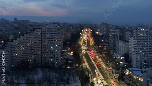 Wallpaper Mural Aerial drone view of the Сity Gates with multiple buildings and moving traffic in the evening, blue hour. Winter in Chisinau, Moldova Torontodigital.ca