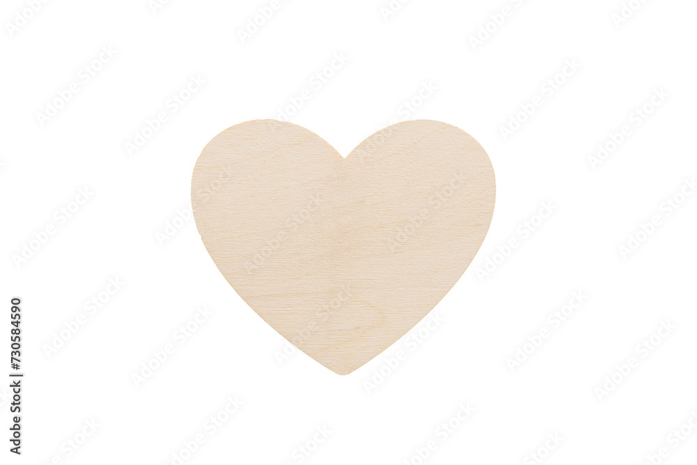 wooden heart on a yellow background pinned with a button