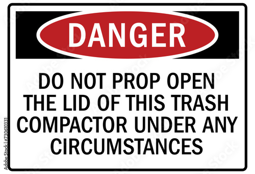 Compactor warning sign do not prop open the lid of this trash compactor under any circumstances