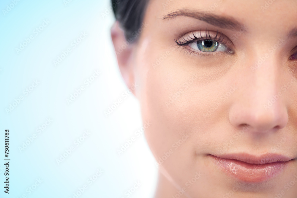 Skincare, beauty space or portrait of model in studio isolated on blue background for pride or wellness. Natural, mockup or smooth face of confident woman or female person with shine or facial glow Skincare, beauty space or portrait of model in studio isolated on blue background for pride or wellness. Natural, mockup or smooth face of confident woman or female person with shine or facial glow