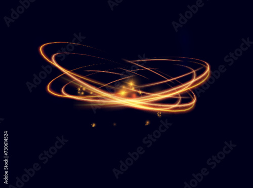 Magical light effect. Rotating luminous ellipses. Dynamic golden rings on black background