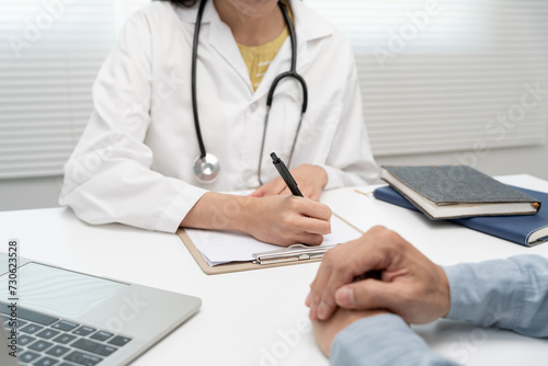 female doctor advice consulting diagnosis and check-up at hospital clinic. Patient explain health problems and symptoms to Professional physician. medical  medicine  treatment  therapy  pharmacy