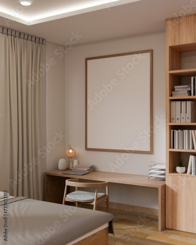 A blank empty picture frame mockup on a white wall, a wooden work table in a modern, cosy bedroom. © bongkarn