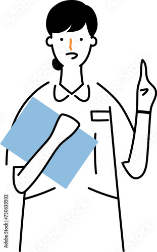 指を立てて説明するナース服を着た女性