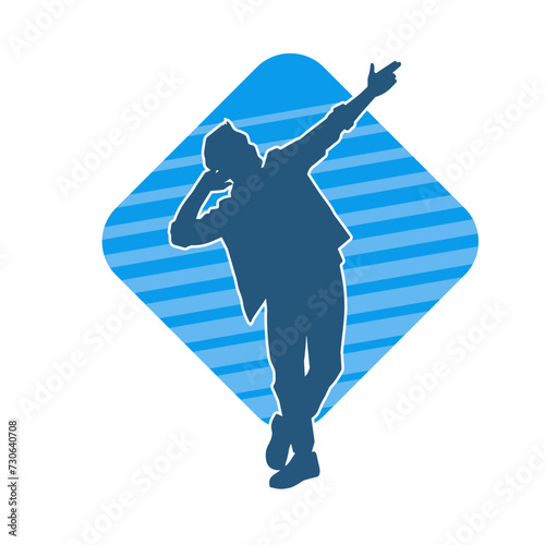 Silhouette of a slim man dancing pose. Silhouette of a male dancer in action pose.