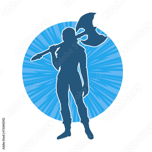 Silhouette of a sexy female warrior in battle armor carrying axe weapon